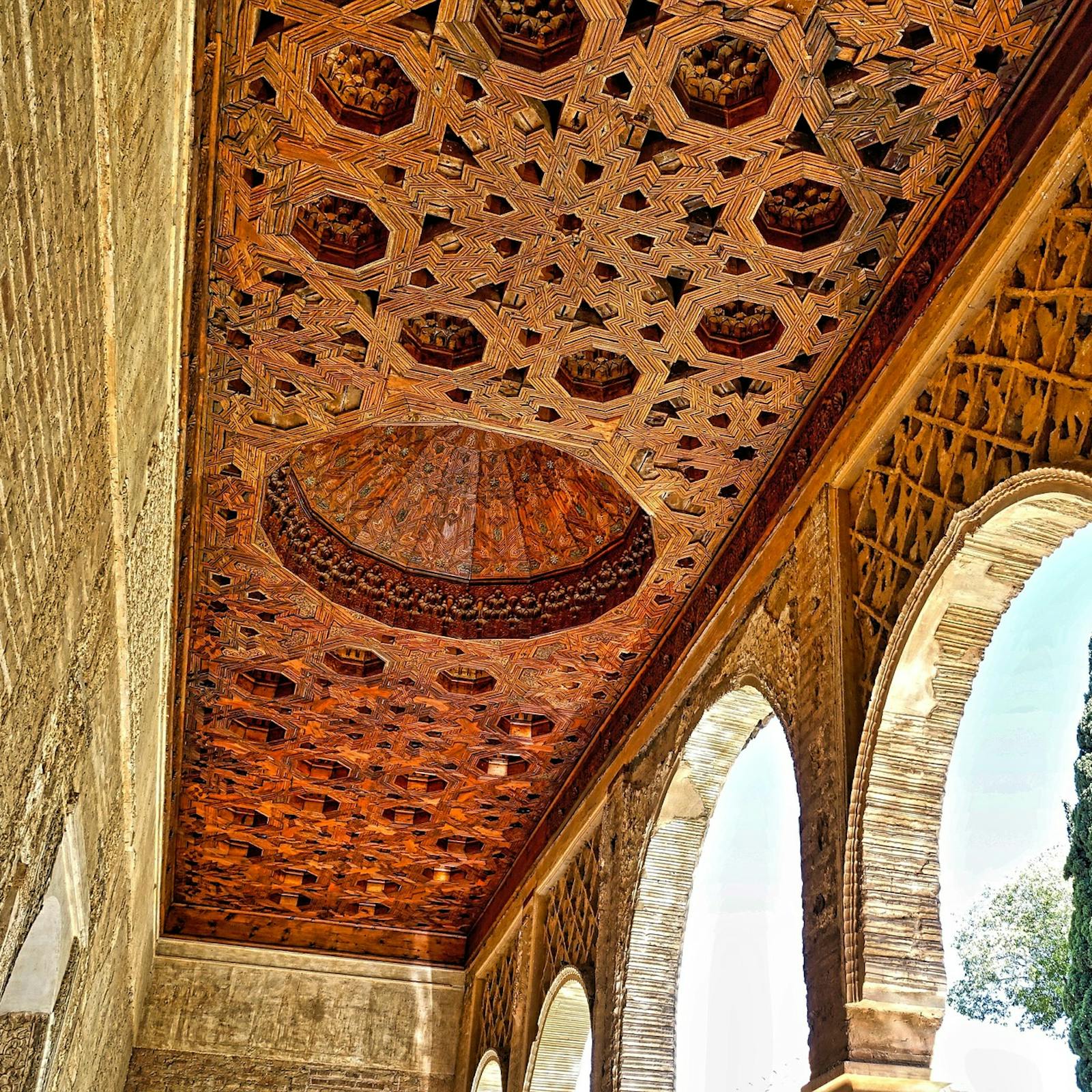 Carved wooden ceiling of the Alhambra seen from below