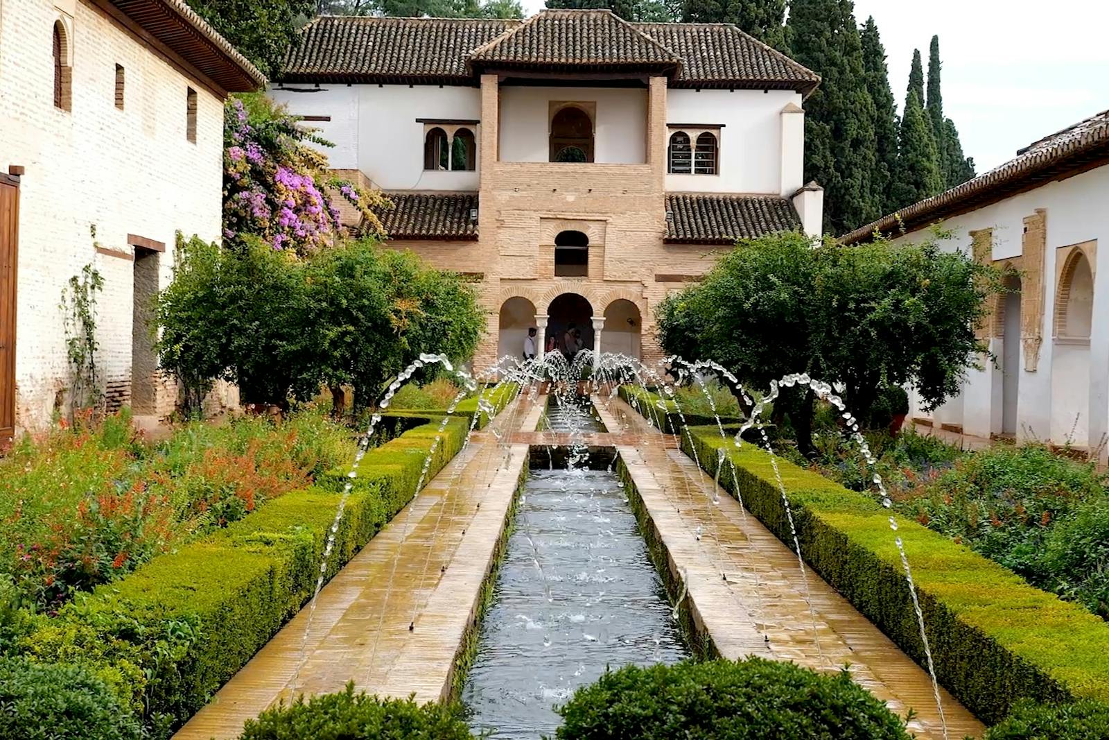 View of the Alhambra garden with fountain
