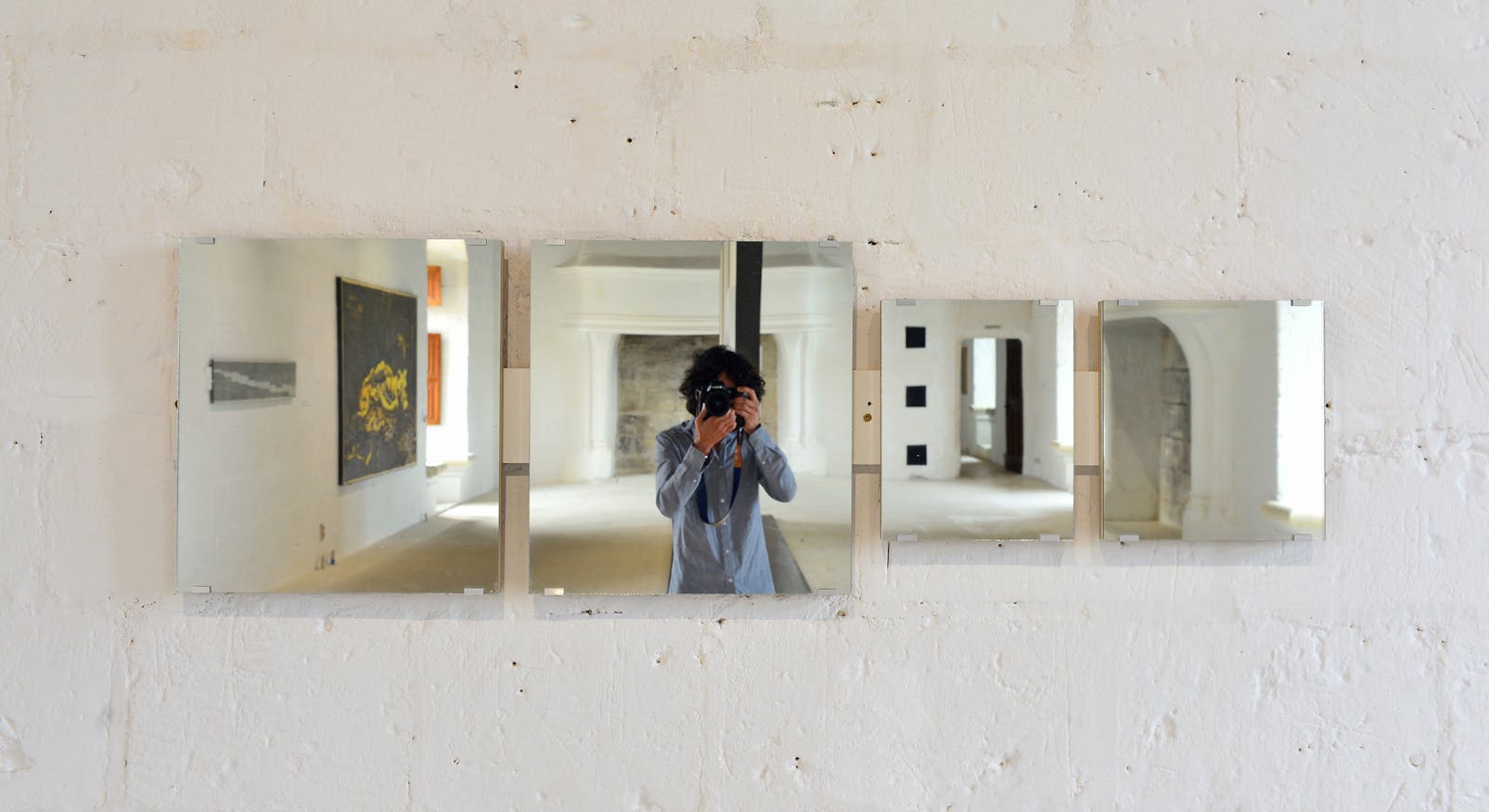 Photographer captured in the mirrors of the Château de Montsoreau